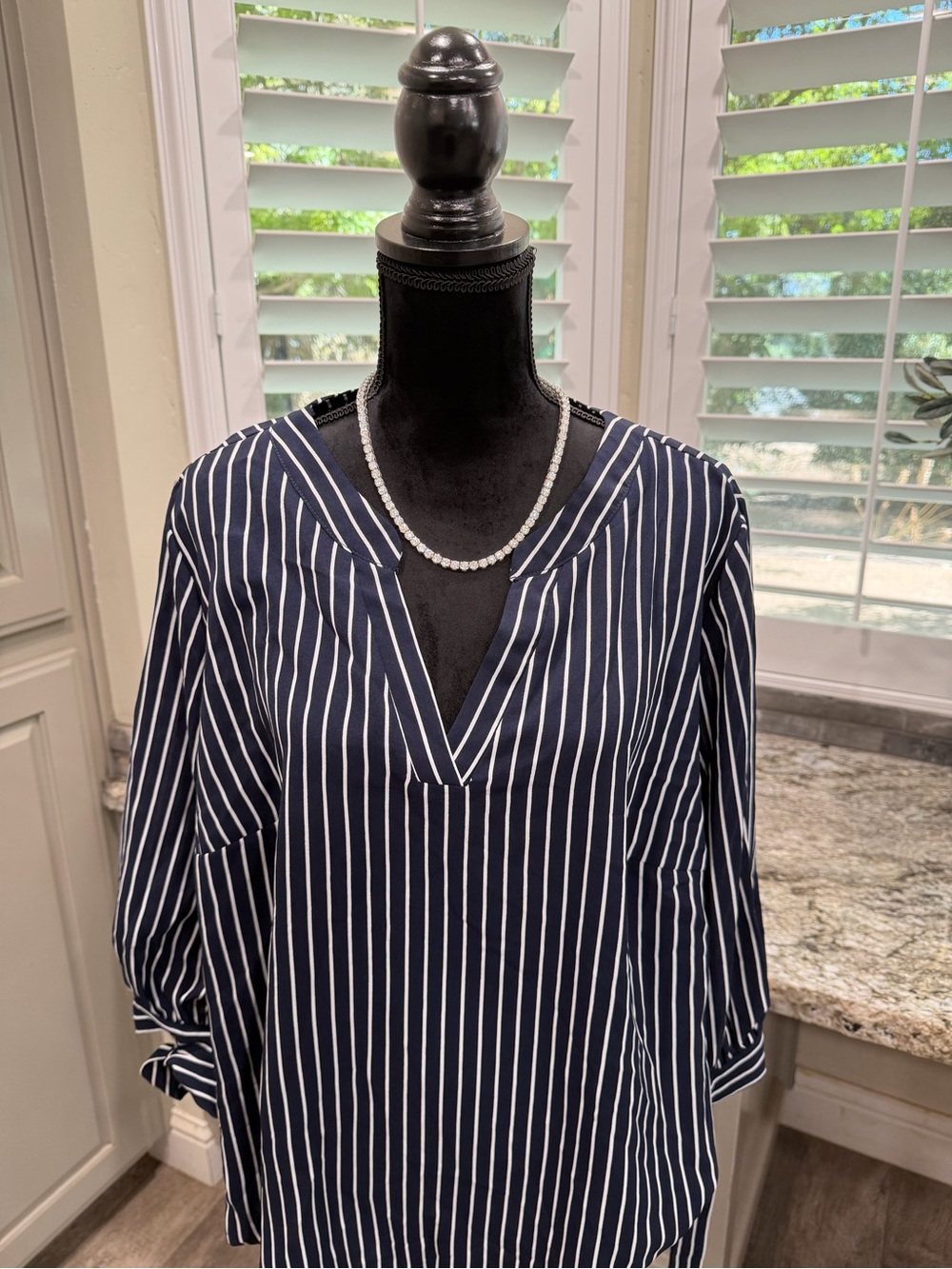 BloomChic Navy and White Striped V‑Neck Blouse